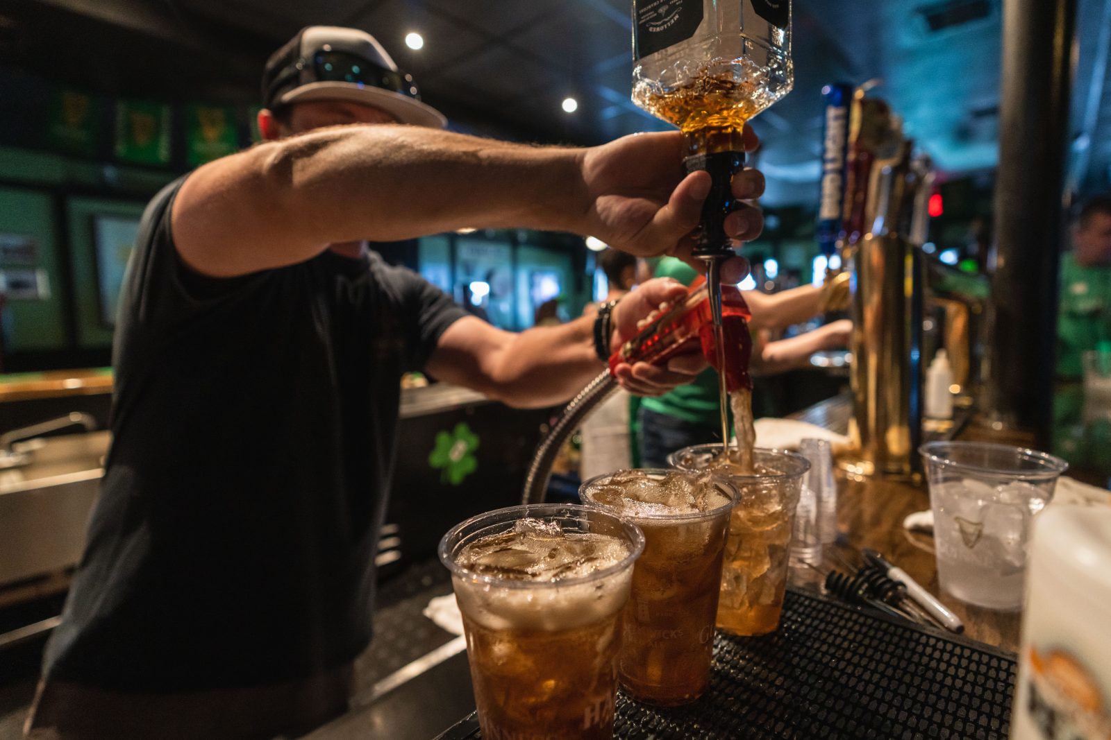 Bartender pouring a drink at Flanagan's Irish Pub in Dunedin, Florida